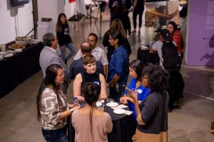 A cross-sector audience of youth, CYD practitioners, and funders enjoy an evening reception at San Diego Art Institute during the 2019 San Diego Creative Youth Development Summit